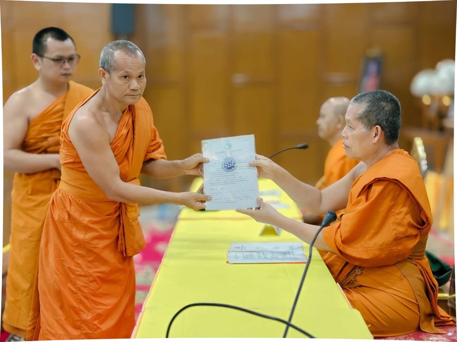 title - วันเสาร์ที่ 25 กรกฎาคม 2569 นายประเสริฐ กาญจนเกียรติกุล ปฏิรูปที่ดินจังหวัดบุรีรัมย์ พร้อมด้วยเจ้าหน้าที่ ส.ป.ก.บุรีรัมย์ มอบหนังสืออนุญาตให้ใช้ที่ดินเพื่อกิจการสาธารณูปโภค กรณีสำนักงานพระพุทธศาสนาแห่งชาติขอใช้ที่ดินเพื่อสร้างวัดจำนวน 7 วัด ในการประชุมคณะสงฆ์จังหวัดบุรีรัมย์ สมัยสามัญ ครั้งที่ 5 ปี 2569 ณ วัดกลาง พระอารามหลวง อำเภอเมืองบุรีรัมย์ จังหวัดบุรีรัมย์